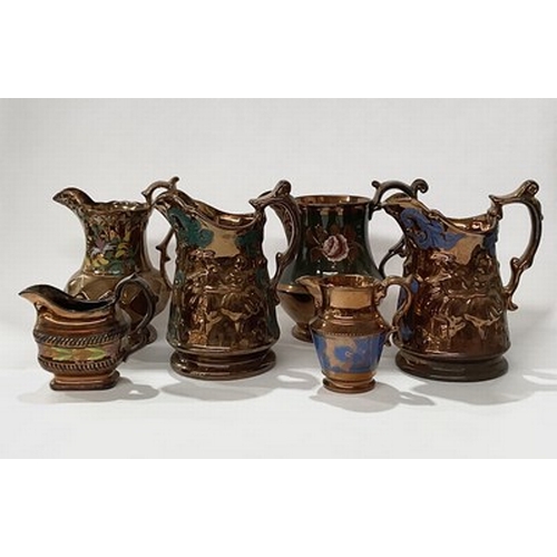 62 - A large collection of 19th century English Staffordshire copper lustreware: teapots, jugs, goblets, ... 