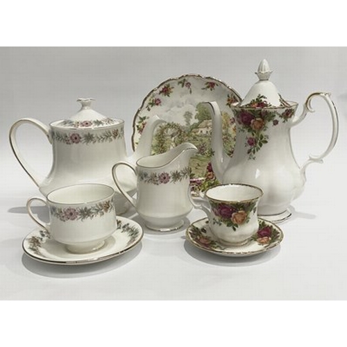 70 - An assortment of Royal Albert tea set and coffee service and china plates 'Belinda', circa 1966, tog... 