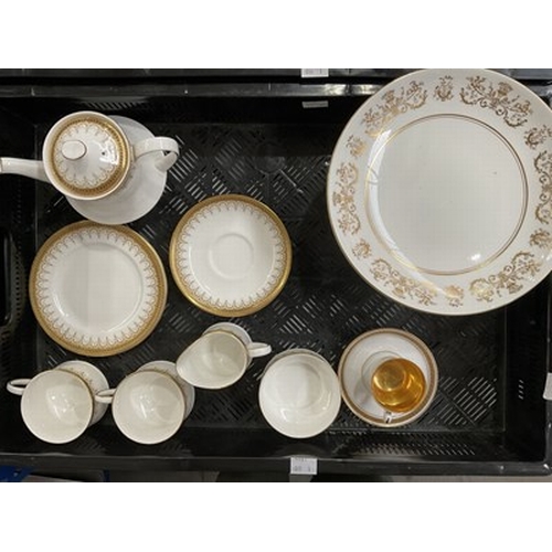 75 - A small Paragon Athena tea set with gold lacing set on a white fluted porcelain background, gloss gl... 