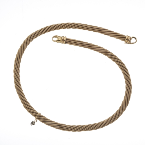 111 - Wellendorff, an 18ct gold braided rope necklace, with signature Wellendorff diamond charm, import ma... 