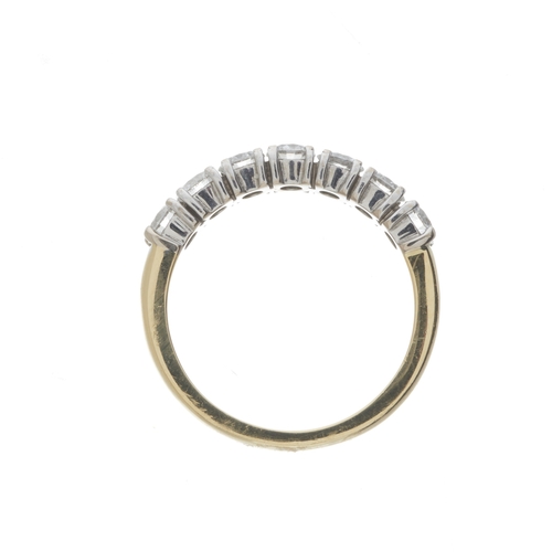 116 - An 18ct gold brilliant-cut diamond half eternity ring, total diamond weight 1.20ct, engraved to band... 