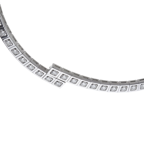 118 - Cartier, a rare 18ct white gold brilliant-cut diamond line Tectonique riviere necklace, estimated to... 