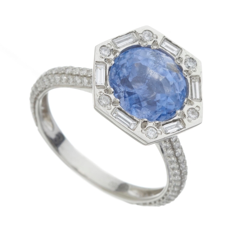 123 - A platinum Sri Lankan sapphire and diamond cluster dress ring, with report from GCS, stating sapphir... 