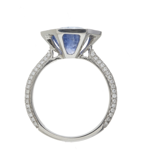 123 - A platinum Sri Lankan sapphire and diamond cluster dress ring, with report from GCS, stating sapphir... 