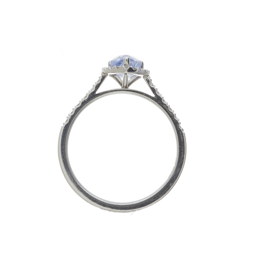 153 - A platinum pear-shape sapphire and brilliant-cut diamond cluster ring, sapphire estimated weight 1ct... 