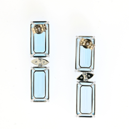 155 - A pair of 18ct gold blue topaz and diamond drop earrings, total blue topaz weight 30.40ct, total dia... 