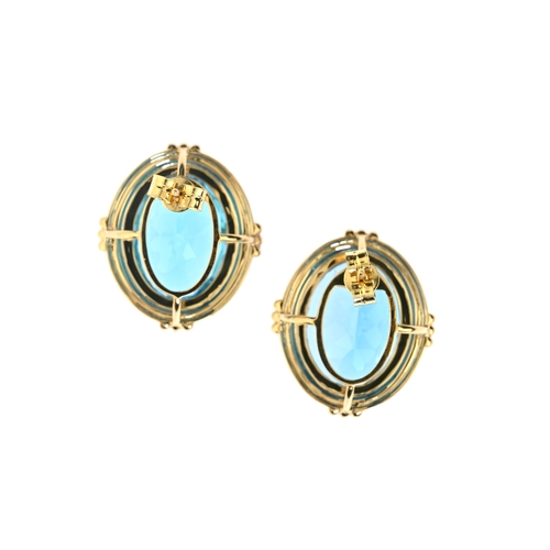 159 - A pair of 18ct gold oval-shape blue topaz stud earrings, with brilliant-cut diamond accent surround,... 