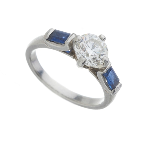 179 - A platinum brilliant-cut diamond single-stone ring, with rectangular-shape sapphire shoulders, diamo... 