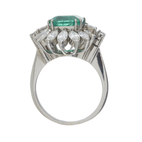 183 - An impressive 18ct gold Colombian emerald and marquise-shape diamond cocktail ring, with brilliant-c... 