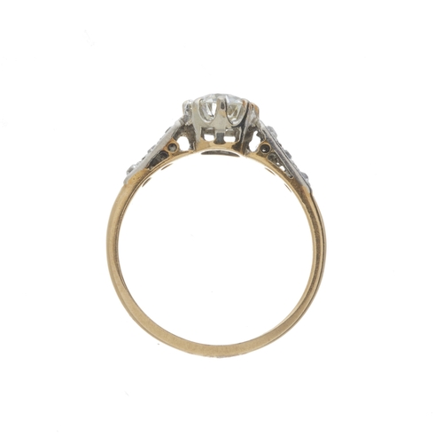 21 - An Edwardian 18ct gold and platinum old-cut diamond single-stone ring, with similarly-cut diamond si... 