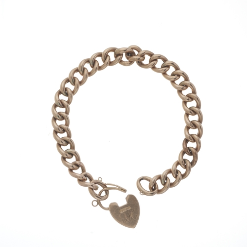 22 - An early 20th century 9ct gold curb-link bracelet, with heart-shape padlock clasp, stamped 9c, lengt... 