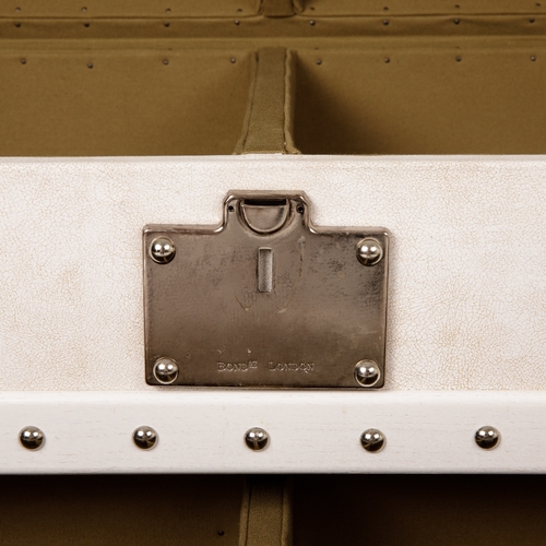 222 - Bond Street London, a contemporary white leather chest, featuring chrome metal hardware, wooden slat... 