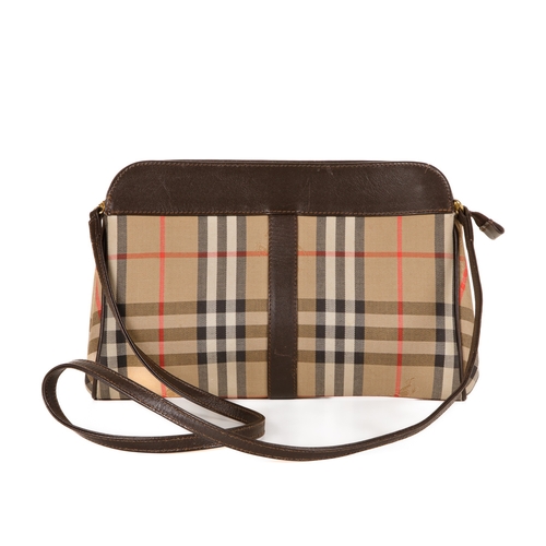 225 - Burberry, a vintage handbag, designed with the maker's Haymarket check canvas exterior and smooth br... 