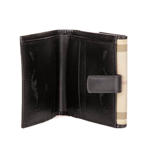 228 - Burberry, a House Check wallet, featuring the maker's classic house check coated canvas exterior wit... 