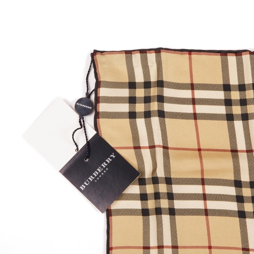 229 - Burberry, two Nova Check silk handkerchiefs, with hand-rolled edges, measuring 47 by 47cm, with make... 