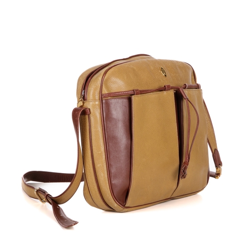 246 - Cartier, a leather Must De Cartier crossbody bag, designed with a grained mustard yellow exterior, w... 