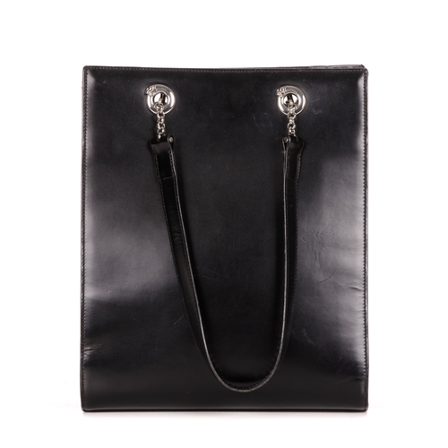 247 - Cartier, a small Panthere tote, featuring a smooth black leather exterior, polished silver-tone hard... 