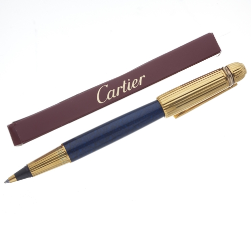 248 - Cartier, a Pasha De Cartier Trinity ballpoint pen, featuring a blue lapis patterned lacquer with rib... 