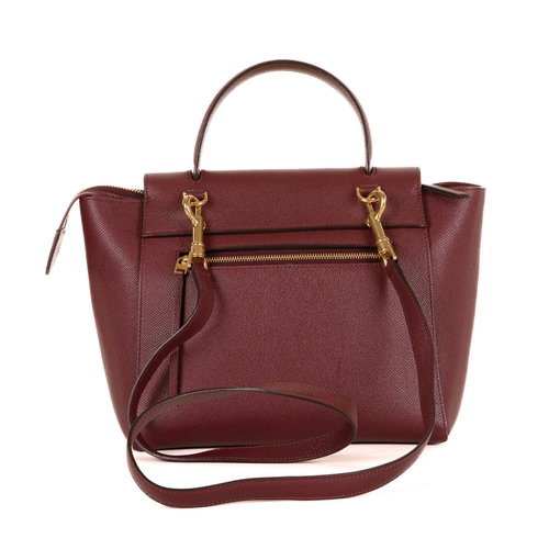 249 - Celine, a Micro Belt handbag, crafted from burgundy grained calfskin leather with gold-tone hardware... 