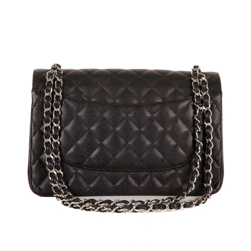 252 - Chanel, a Jumbo Classic Double Flap handbag, featuring a black caviar quilted leather exterior, with... 