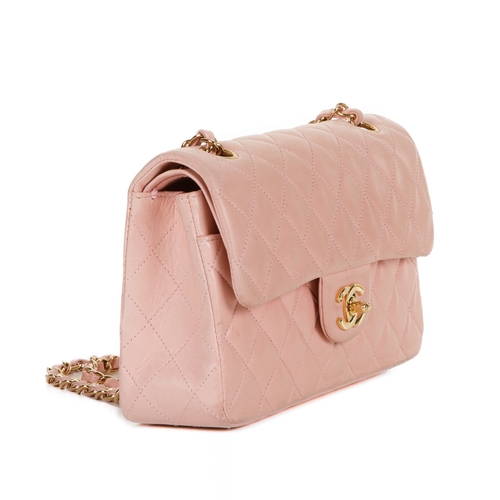 254 - Chanel, a pink Small Classic Double Flap handbag, designed with a pink diamond quilted lambskin leat... 