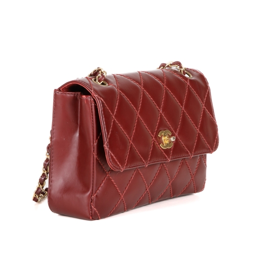 258 - Chanel, a burgundy Wild Stitch Single Flap handbag, featuring the maker's signature wild stitch diam... 