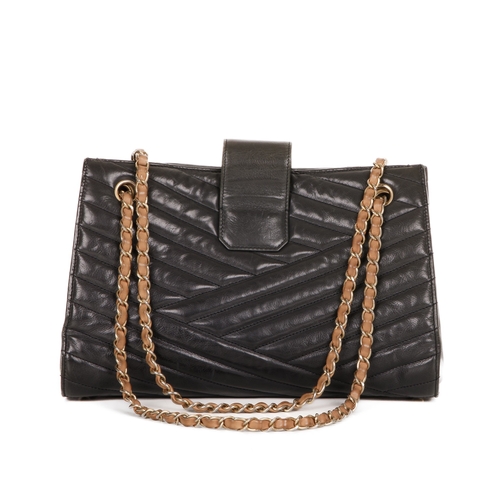 263 - Chanel, a Gabrielle Accordion tote, featuring a chevron-quilted leather exterior, with brushed gold-... 