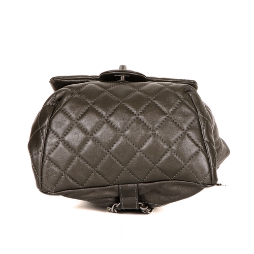 265 - Chanel, a small drawstring backpack, crafted from metallic pewter leather, featuring antiqued silver... 