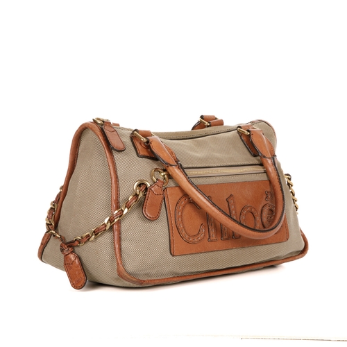 270 - Chloe, a Haley handbag, designed with a khaki canvas exterior with tan leather trim, featuring a fro... 