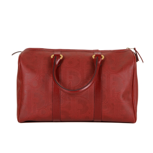 273 - Christian Dior, a red Boston bag, designed with a large Diroissimo patterned coated canvas exterior ... 