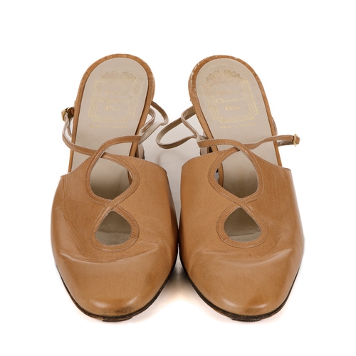 274 - Christian Dior, a pair of vintage shoes, designed with beige leather uppers, cut-out detailing at th... 