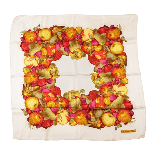 276 - Christian Dior, a silk scarf, featuring a wide border of fruits including apples, pears, plums, rasp... 