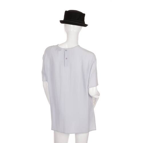 282 - Emporio Armani, two silk blouses and two hats, to include matching pale blue and baby pink short-sle... 