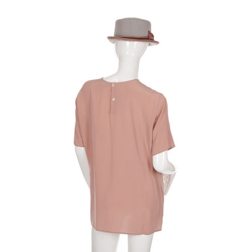 282 - Emporio Armani, two silk blouses and two hats, to include matching pale blue and baby pink short-sle... 