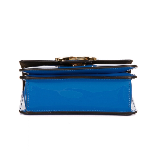 288 - Fendi, a Karligraphy patent leather handbag, designed with a blue patent leather exterior, with poli... 