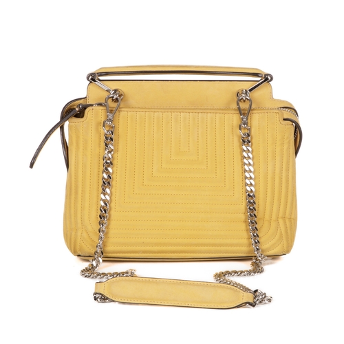 289 - Fendi, a yellow Dotcom handbag, designed with a quilted yellow nubuck leather exterior, silver-tone ... 