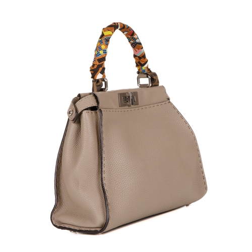 290 - Fendi, a medium Peekaboo Selleria handbag w/Twilly, designed with a grey leather exterior, featuring... 