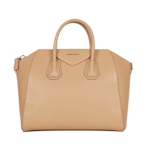 294 - Givenchy, an Antigona handbag, designed with a grained camel leather exterior, with a triangular pat... 