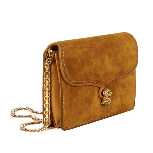 299 - Gucci, a rare 1970s suede two-way handbag, designed with a mustard suede exterior with leather sides... 