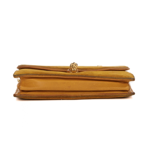 299 - Gucci, a rare 1970s suede two-way handbag, designed with a mustard suede exterior with leather sides... 