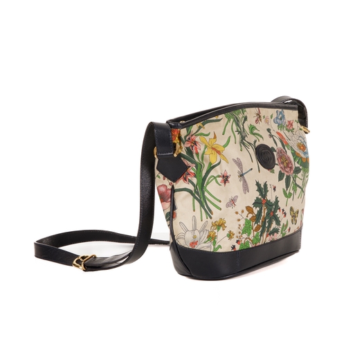 300 - Gucci, a vintage Floral crossbody handbag, designed with a coated canvas exterior with multicoloured... 