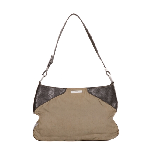 302 - Gucci, a shoulder bag, designed with a khaki green nylon exterior with grained brown leather trim, b... 