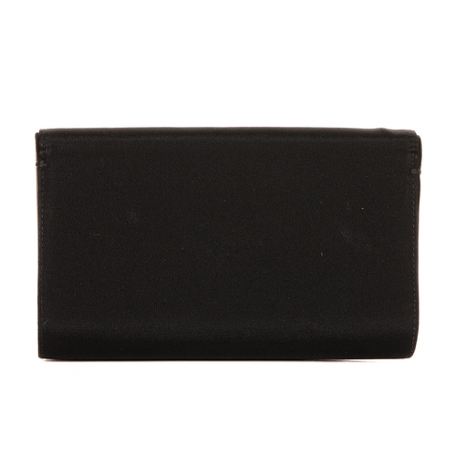 305 - Gucci, a vintage clutch, designed with a structured shape, with a black fabric exterior, gold-tone G... 