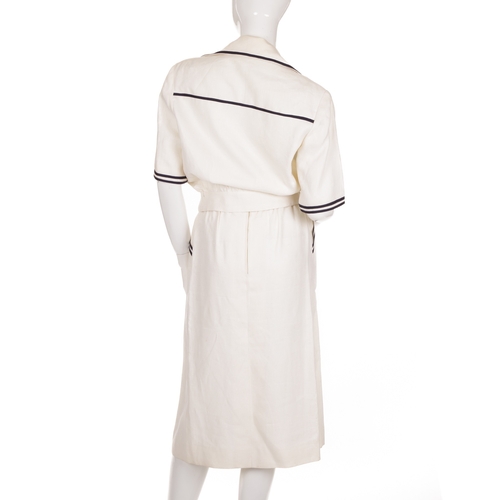 312 - Gucci, a ladies 1970s linen outfit, the cream two-piece sailor-style suit, comprising a cropped jack... 