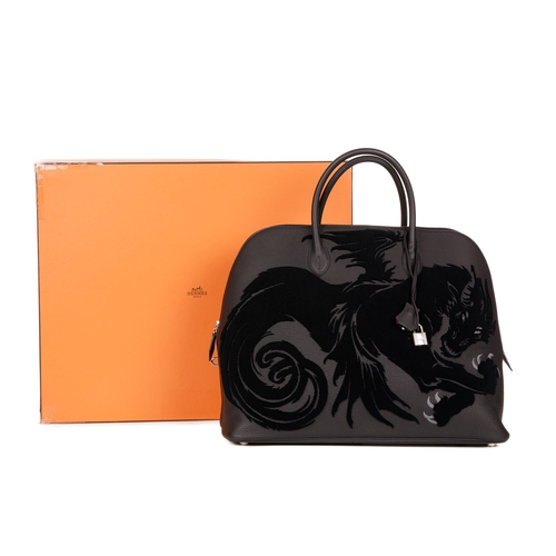 315 - Hermes, a 2019 limited edition Chimeres Dragon Bolide travel handbag, crafted from black Togo leathe... 