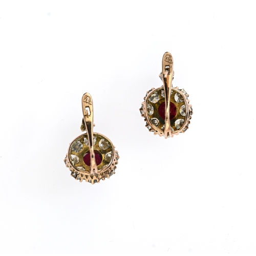 32 - A pair of gold unheated Madagascan ruby and brilliant-cut diamond cluster earrings, verbal from GCS ... 