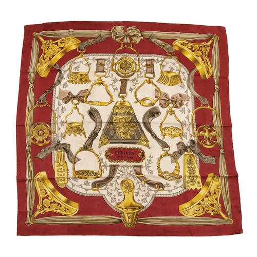 321 - Hermes, an Etriers silk scarf, designed by Francoise de la Perriere, first issued in 1964, and featu... 