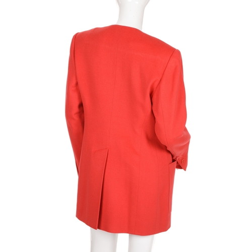 329 - Hermes, a 1980s red cashmere jacket, featuring a V-neck, front button fastenings, two exterior patch... 