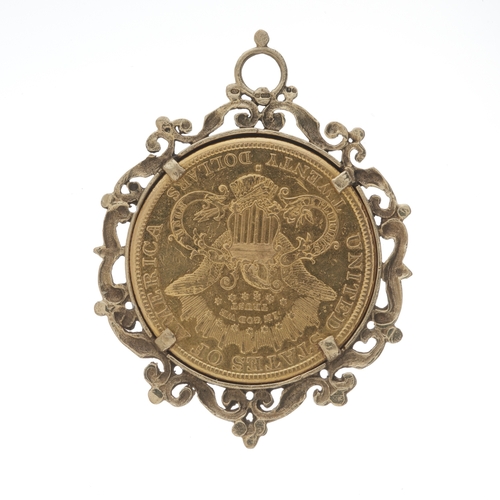 33 - USA 1883, a gold double eagle twenty dollar coin, within a 9ct gold pendant mount, mount with hallma... 