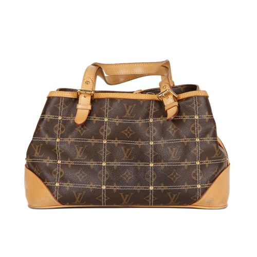 339 - Louis Vuitton, a limited edition Riveting tote, designed by Marc Jacobs, crafted from monogram-coate... 